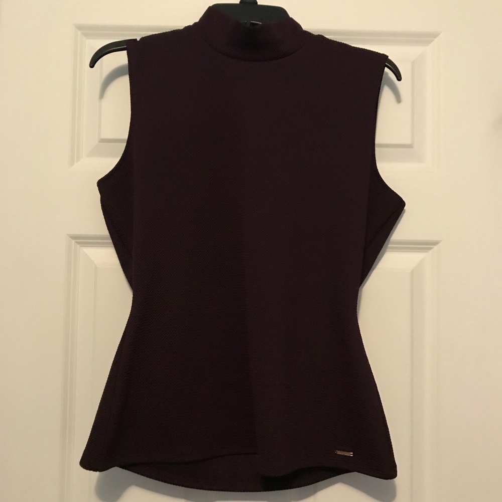 Plum colored Calvin Klein tank.